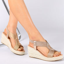 Niyar – Espadrilles Sandalen mit Keilabsatz und gewebtem Fersenriemen – Gold