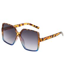 Trendiges Design Übergröße für Damen | UV Schutz – Schwarzer Leopard