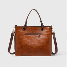 Elegante Handtasche aus hochwertigem pflanzlich gegerbtem Leder mit doppelten Fächern und Vintage-Charme – Braun