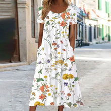 Eloise – Maxikleid im Bohemian-Stil mit Blumenmuster und Taschen | Kurzärmliges Maxikleid mit Blumenmuster im Boho-Chic-Stil für Damen – Weiß