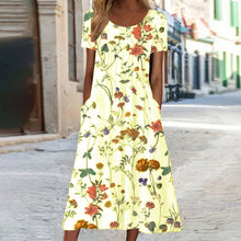 Eloise – Maxikleid im Bohemian-Stil mit Blumenmuster und Taschen | Kurzärmliges Maxikleid mit Blumenmuster im Boho-Chic-Stil für Damen – Gelb