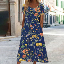 Eloise – Maxikleid im Bohemian-Stil mit Blumenmuster und Taschen | Kurzärmliges Maxikleid mit Blumenmuster im Boho-Chic-Stil für Damen – Dunkelblau