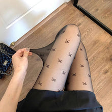 Leah | Modische Strumpfhosen mit Herz und Punktmuster – Schwarzer Bogen