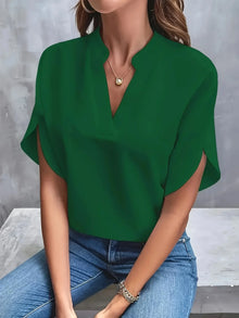 Norlina | Elegante Bluse mit verspielten Flügelärmeln – Grün