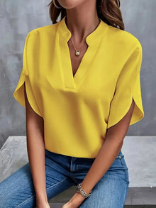 Norlina | Elegante Bluse mit verspielten Flügelärmeln – Gelb