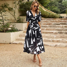 Liriane | Elegantes Midi-Kleid mit verspieltem Druck – Schwarz