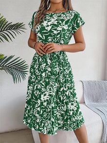 Plisseekleid mit Taillengürtel | Florales Muster | Elegante Silhouette – Blumen | Grün