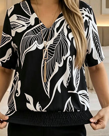 Isheba – Elegante Kurzarmbluse – Schwarz