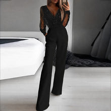Catherina - Damen-Jumpsuit mit V-Ausschnitt und Glanzeffekt – Schwarz