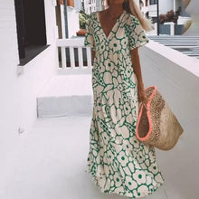Maxikleid mit Blumenmuster | V-Ausschnitt | Weit schwingender Schnitt – Grün