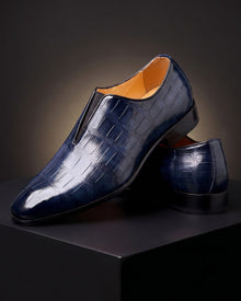 Amphon – Loafer mit Krokodilprägung und Slip-On-Passform – Blau